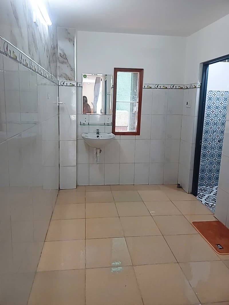 Nhà 2 tầng 50m² mặt tiền 4m /36/12 Tôn Đản, Cẩm Lệ — gần chợ, gần trường học, ô tô đỗ cửa, có dòng tiền